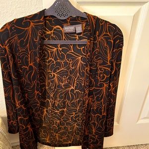 Additions by Chico’s jacket Size 1.5, black w rust design.